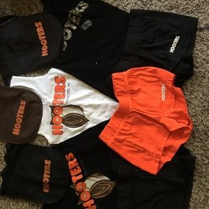 2 xs tanks 2xs shorts 2 pouches.